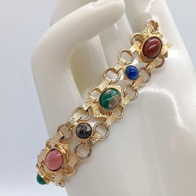 LOT 149: Enameled Austrian Cuff Bracelets, Monet Gold-Tone and White Bangle & More