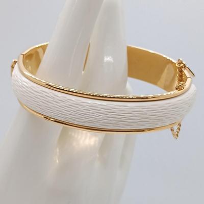 LOT 149: Enameled Austrian Cuff Bracelets, Monet Gold-Tone and White Bangle & More