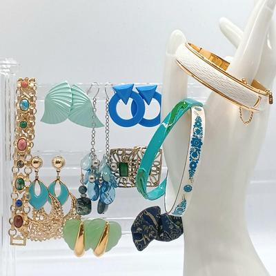 LOT 149: Enameled Austrian Cuff Bracelets, Monet Gold-Tone and White Bangle & More