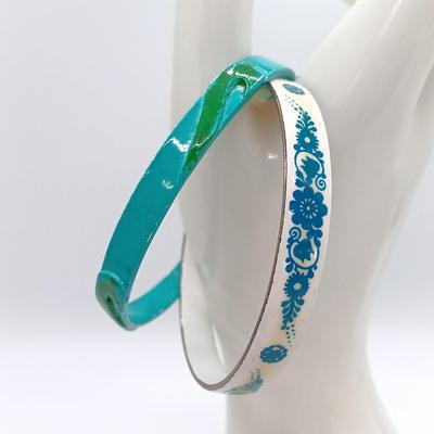 LOT 149: Enameled Austrian Cuff Bracelets, Monet Gold-Tone and White Bangle & More