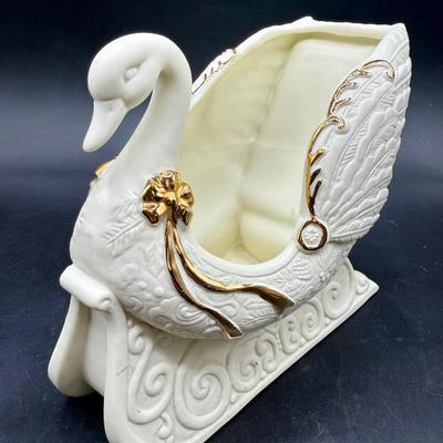 Sale Photo Thumbnail #610: Bisque ceramic with golden accent, can be used a planter or to hold other Christmas-themed items or even small Christmas cards.  Like-new condition, approx. 6.5" tall.