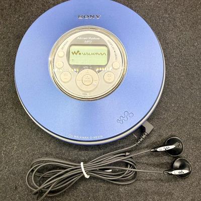 Sale Photo Thumbnail #335: Model D-NE319. Includes matched Sony corded earbuds, but does not include DC power supply. Tested with batteries, work and sounds great.