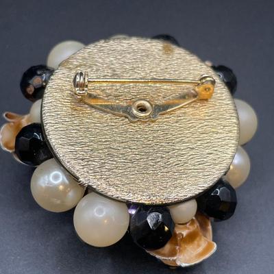 Faux pearl brooch and clip on earrings