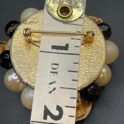 Faux pearl brooch and clip on earrings