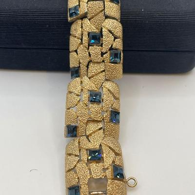 Trifari bracelet and clip on earrings