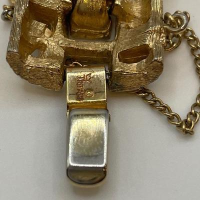 Trifari bracelet and clip on earrings