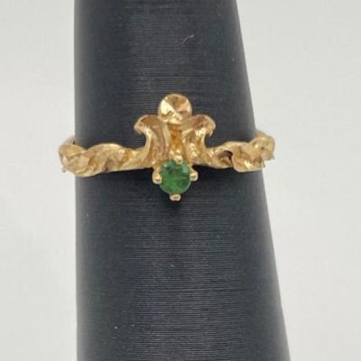 14k gold ring with small green stone, possible emerald