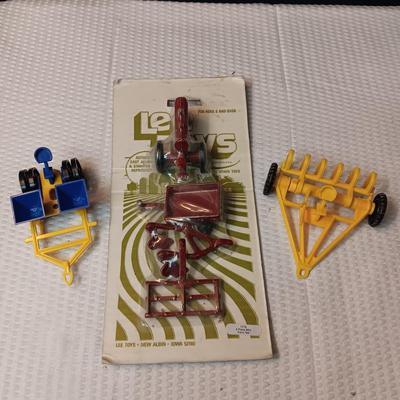 4 PIECE MINI FARM SET TOY AND 2 IMPLEMENTS