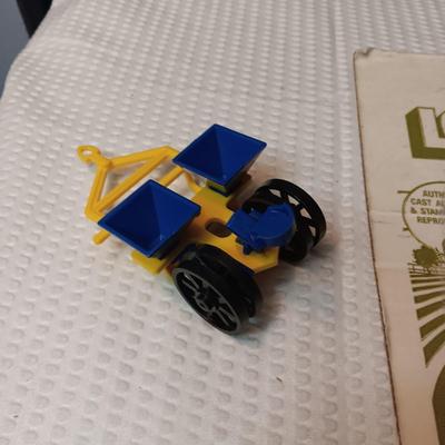 4 PIECE MINI FARM SET TOY AND 2 IMPLEMENTS