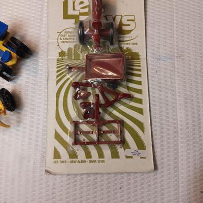 4 PIECE MINI FARM SET TOY AND 2 IMPLEMENTS