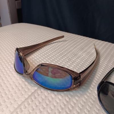 PAIR OF RAZOR AND A NO NAME SUNGLASSES