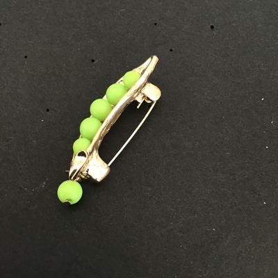 Very cute gold tone peas in a pod brooch