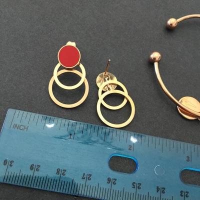 Cute copper, toned, knotted cuff, bracelet, and earrings set