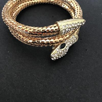 Very cool gold tone tube type snake bracelet