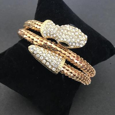 Very cool gold tone tube type snake bracelet
