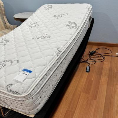 Sold Twin Serta Perfect Sleeper Mattress with adjustible frame