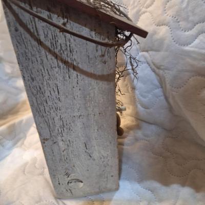 birdhouse with bracket to hang on a wall