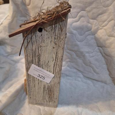 birdhouse with bracket to hang on a wall