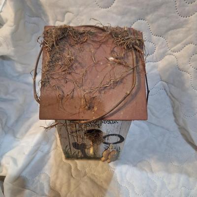 birdhouse with bracket to hang on a wall