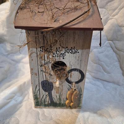 birdhouse with bracket to hang on a wall