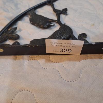 cast iron bird and branch plant hanger