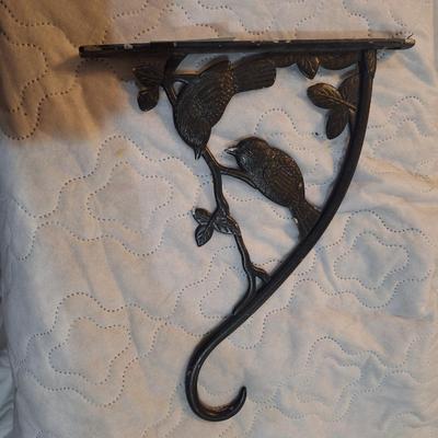 cast iron bird and branch plant hanger