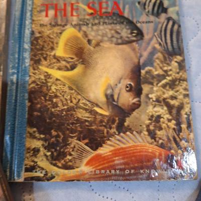 vintage book-"Prehistoric Animals," "Indians and the Old West," "The Sea," and "The Moon".
