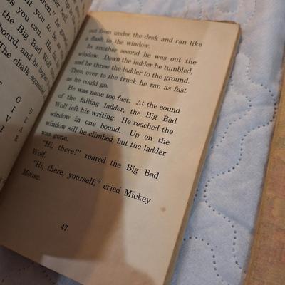  two vintage children's books, one titled School Days in Disney Ville and the other Boo the Little Indian. 