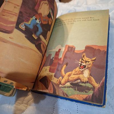  two vintage children's books, one titled School Days in Disney Ville and the other Boo the Little Indian. 