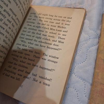  two vintage children's books, one titled School Days in Disney Ville and the other Boo the Little Indian. 