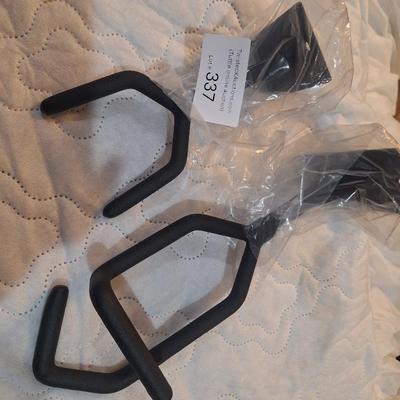 wall brackets to hold or display a rifle or shotgun