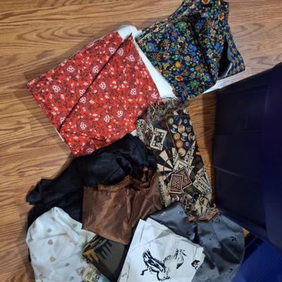 Roughneck tub full of fabric pieces