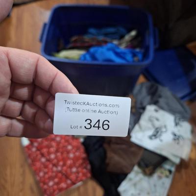 Roughneck tub full of fabric pieces