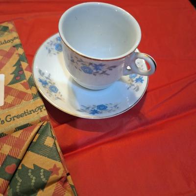 vintage demitasse teacup and saucer blue floral and gold trim