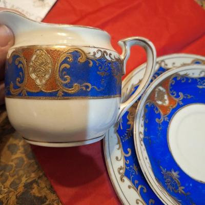 Hira China blue and gold creamer and 2 saucers