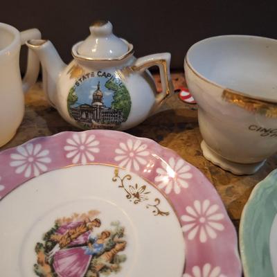 mismatched teacups and saucers