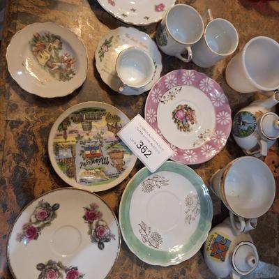 mismatched teacups and saucers