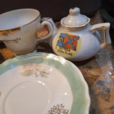mismatched teacups and saucers