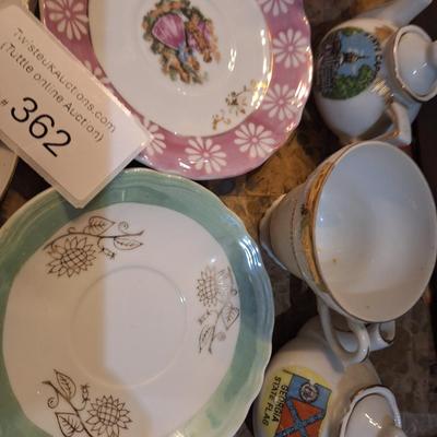 mismatched teacups and saucers