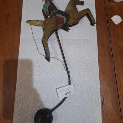 vintage folk art metal cowboy on a bucking horse pendulum balancing toy