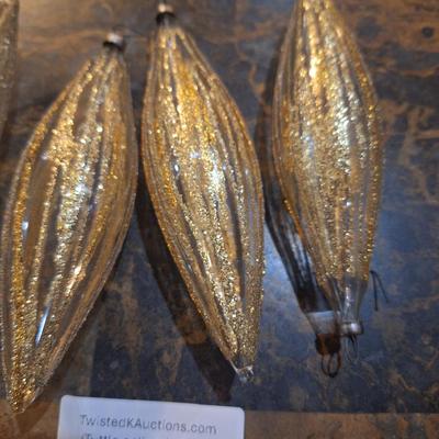 clear glass with gold glitter ornaments