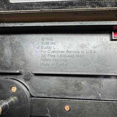 Sale Photo Thumbnail #315: Includes Buddy L, Ertl, Structo, and more. Total of ten pieces. Some are pressed steel. There is age and use related wear, and some pieces may have minor missing parts. Measurement of longest: 21”L. [VY]