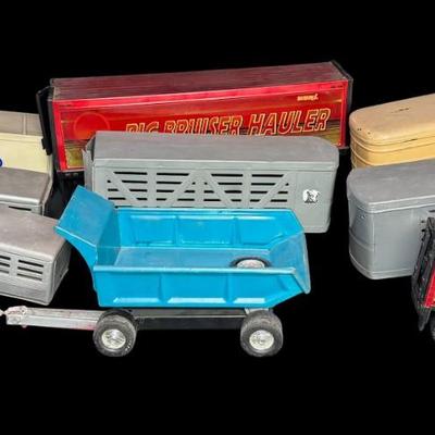 Sale Photo Thumbnail #310: Includes Buddy L, Ertl, Structo, and more. Total of ten pieces. Some are pressed steel. There is age and use related wear, and some pieces may have minor missing parts. Measurement of longest: 21”L. [VY]
