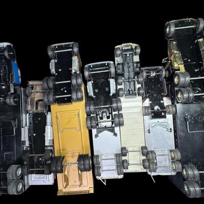 Sale Photo Thumbnail #319: Includes Structo, Tonka, Nylint, and more. Total of nine pieces. There is age and use related wear, and there may or may not be missing accessories. Measurement of longest: 24”L. [VY]