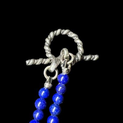 Sale Photo Thumbnail #334: Includes a mesh Deco style purse/wristlet with cabochon, and a lapis toggle necklace. Age related wear. The beaded necklace measures 17”L. [VY]