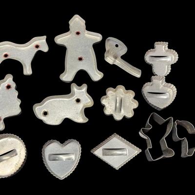Sale Photo Thumbnail #356: Includes animals, figures, and more. Total of 13 pieces. Some have raised handles. Age related wear. Measurement of longest: 6”L. [SR]