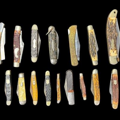 Sale Photo Thumbnail #365: Includes Schrade, Parker-Brothers, Sabre, and more. Total of 22 pieces. Age related wear,  including surface rust and/or broken blades. Measurement of longest: 5.25”L. [KD]