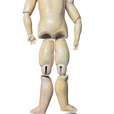Sale Photo Thumbnail #378: This doll body is missing the head. It is made of bisque. Includes a dress and knickers. Age related wear. Measurement: 20”L (without head). Pre-auction: $50-$100. [SR]
