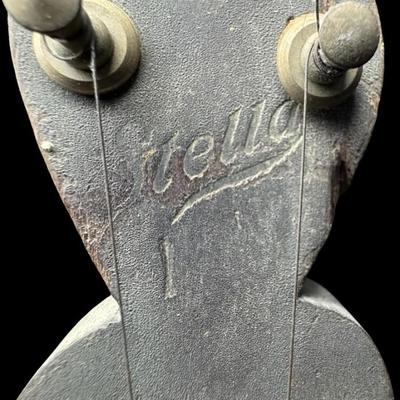 Sale Photo Thumbnail #390: Includes a mandolin banjo, and what is believed to be a 19th century J.H. Buckbee banjo. Both are nickel plated, open back banjos. Both need to be repaired. Measurement of largest: 35”L. [KD]