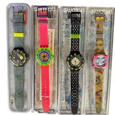 Sale Photo Thumbnail #406: Includes watches from the late 1980s or early 1990s. Both men’s and ladies’ pieces. These have easy to remove battery compartments. Total of ten watches and one spare band. The band on one of the watches is broken. Not tested. [RY]